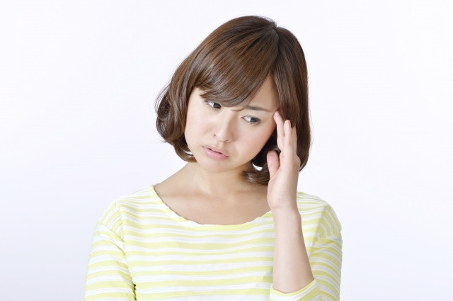頭痛の女性　写真